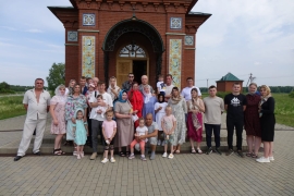Крещение детей в храме святителя Николая Чудотворца в Путимке